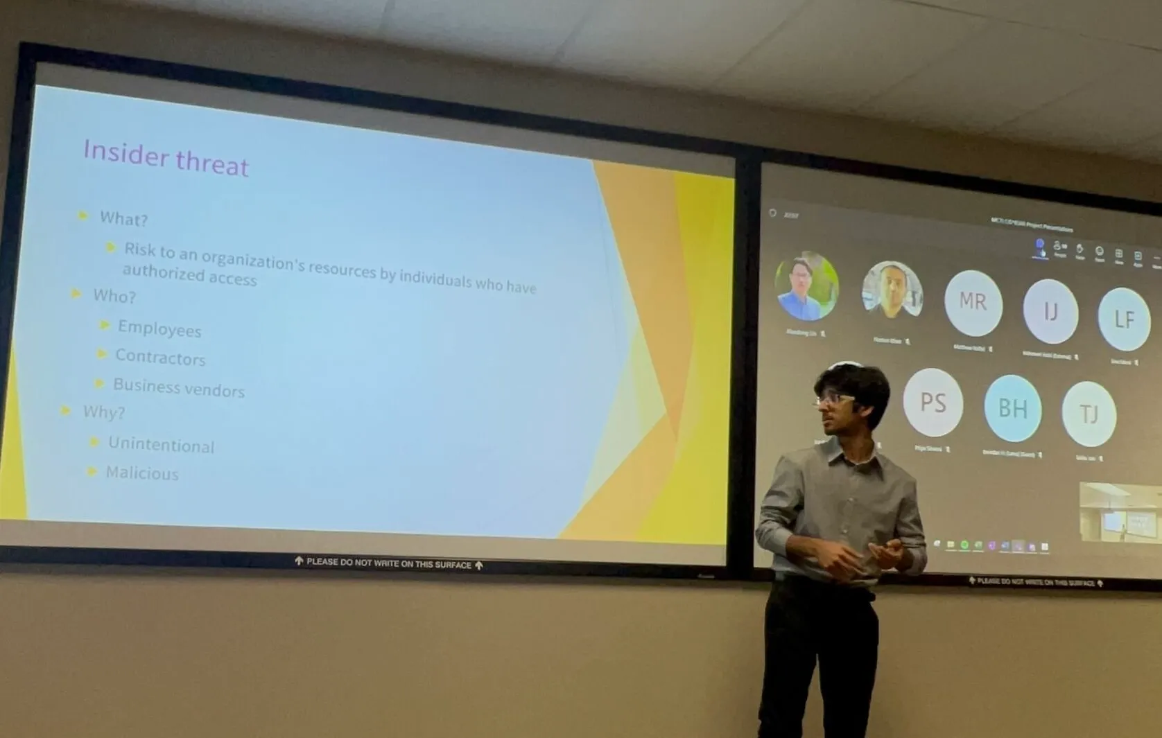Me presenting about insider threat for EQ at UoG